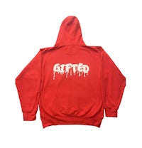 a red hoodie with the word glitter on it